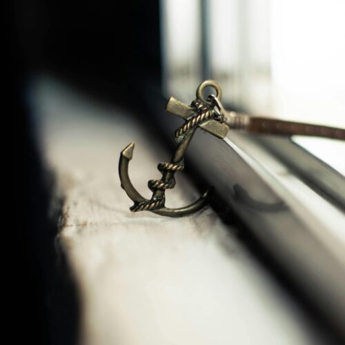 An anchor keychain is a small decorative item resembling an anchor, often used to hold keys.