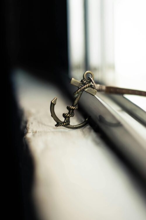 An anchor keychain is a small decorative item resembling an anchor, often used to hold keys.
