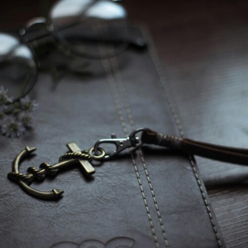 An anchor keychain is a small decorative item resembling an anchor, often used to hold keys.